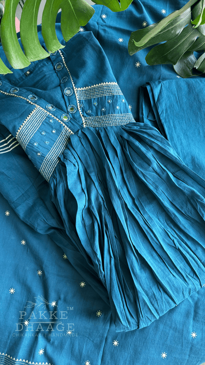 Teal blue kurta set with contrast embroidery and mirror work