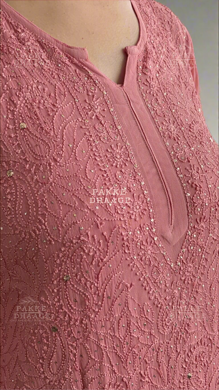 Close-up of a mocha chikankari garment.